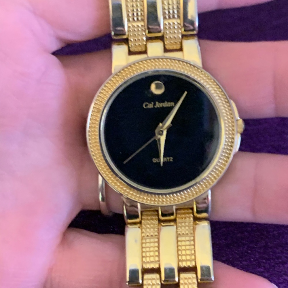 Elegant Gold Cal Jordan Watch with Black Face excellent condition